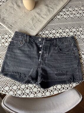 Levi's 501 distressed black shorts